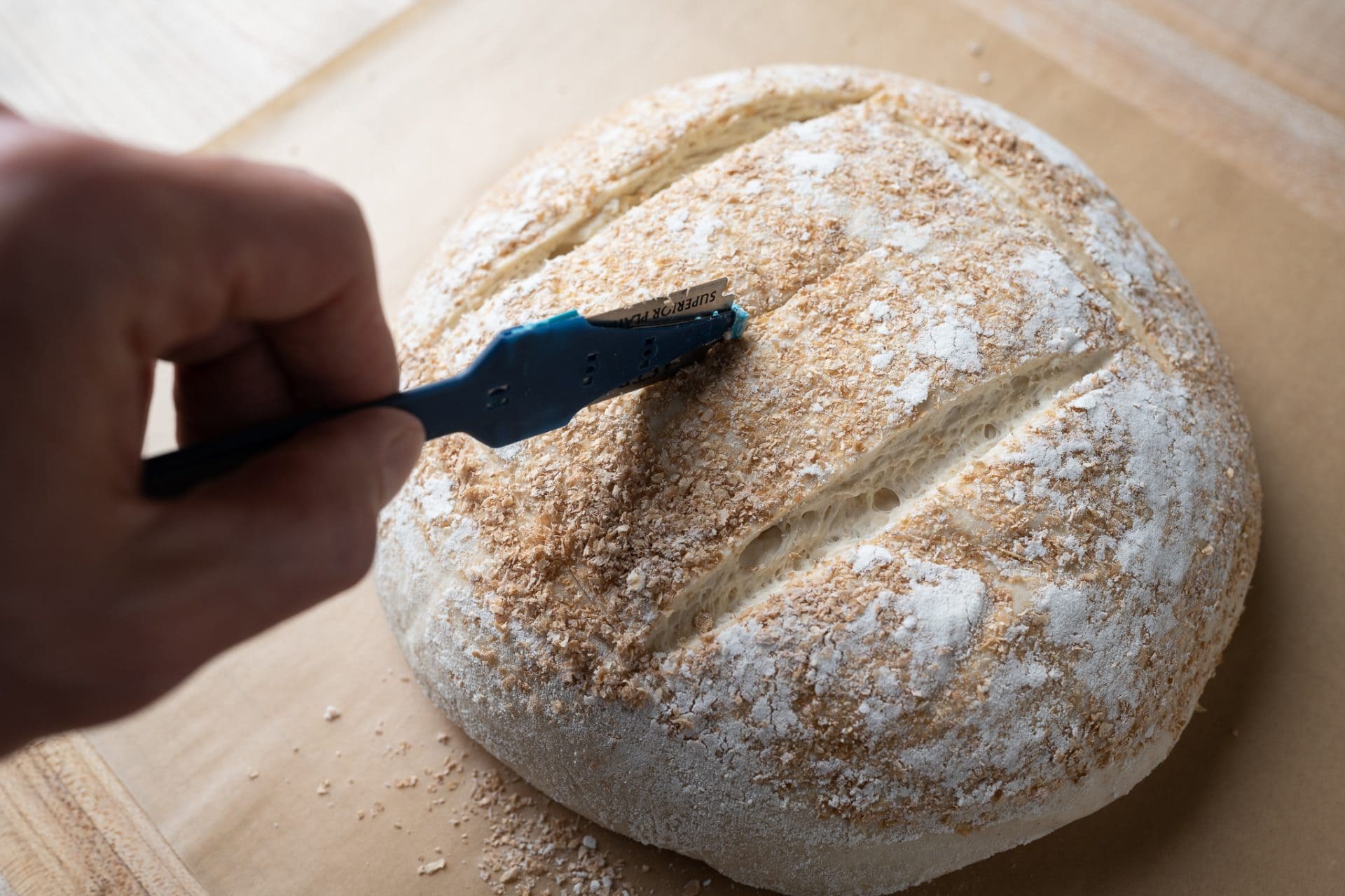 Scoring sourdough bread dough