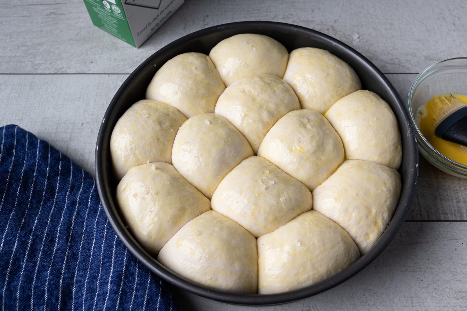 Super soft sourdough dinner rolls ready for the oven
